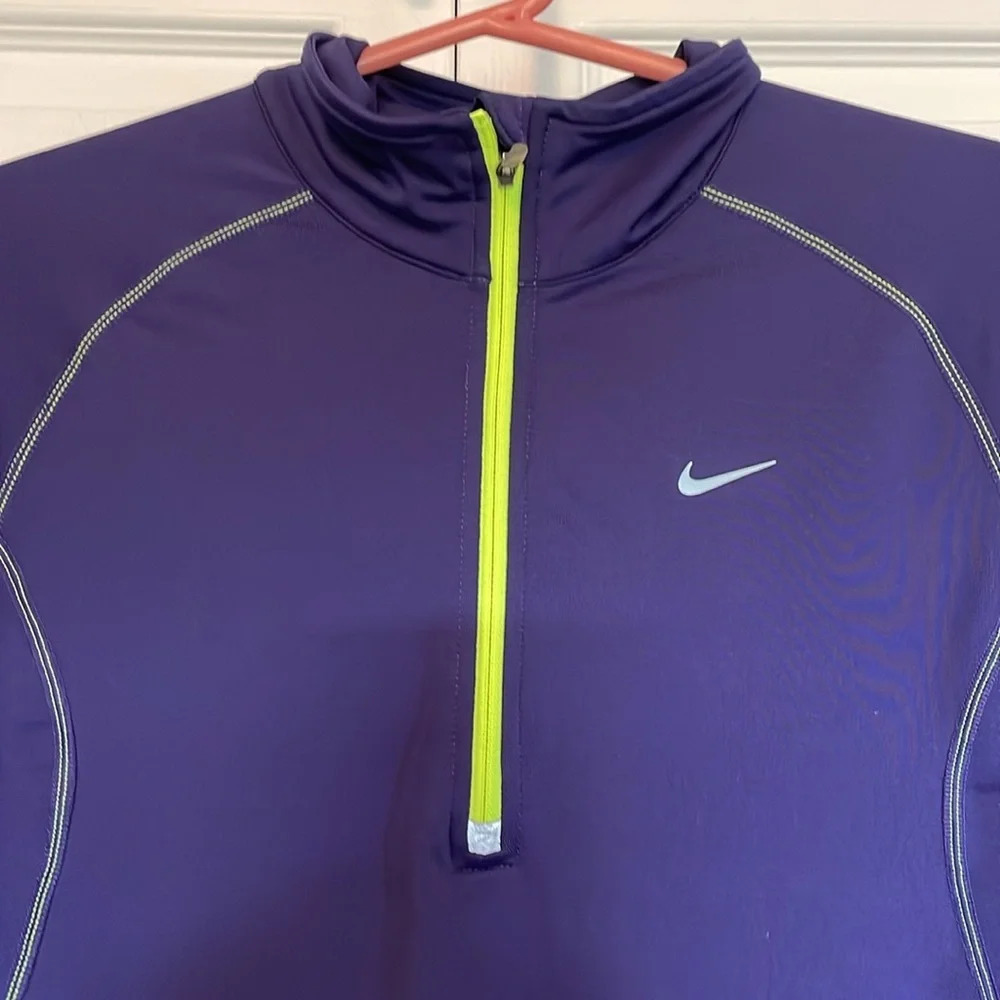 Nike drifit quarterzip sz M.  Purple with neon trim. Stitching detail, collar